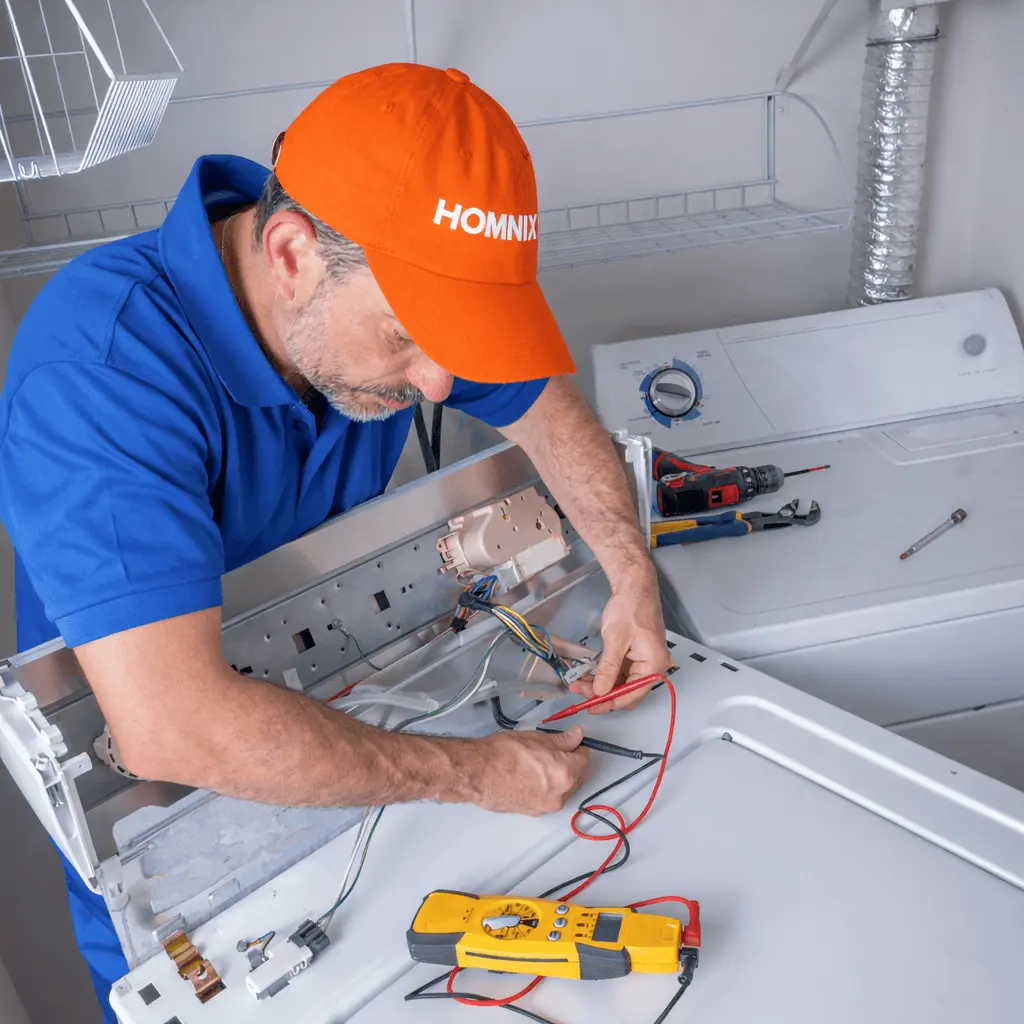 Washing Machine Repair in Moncton | Homnix Fast & Reliable Help Technician testing washing machine repair wiring